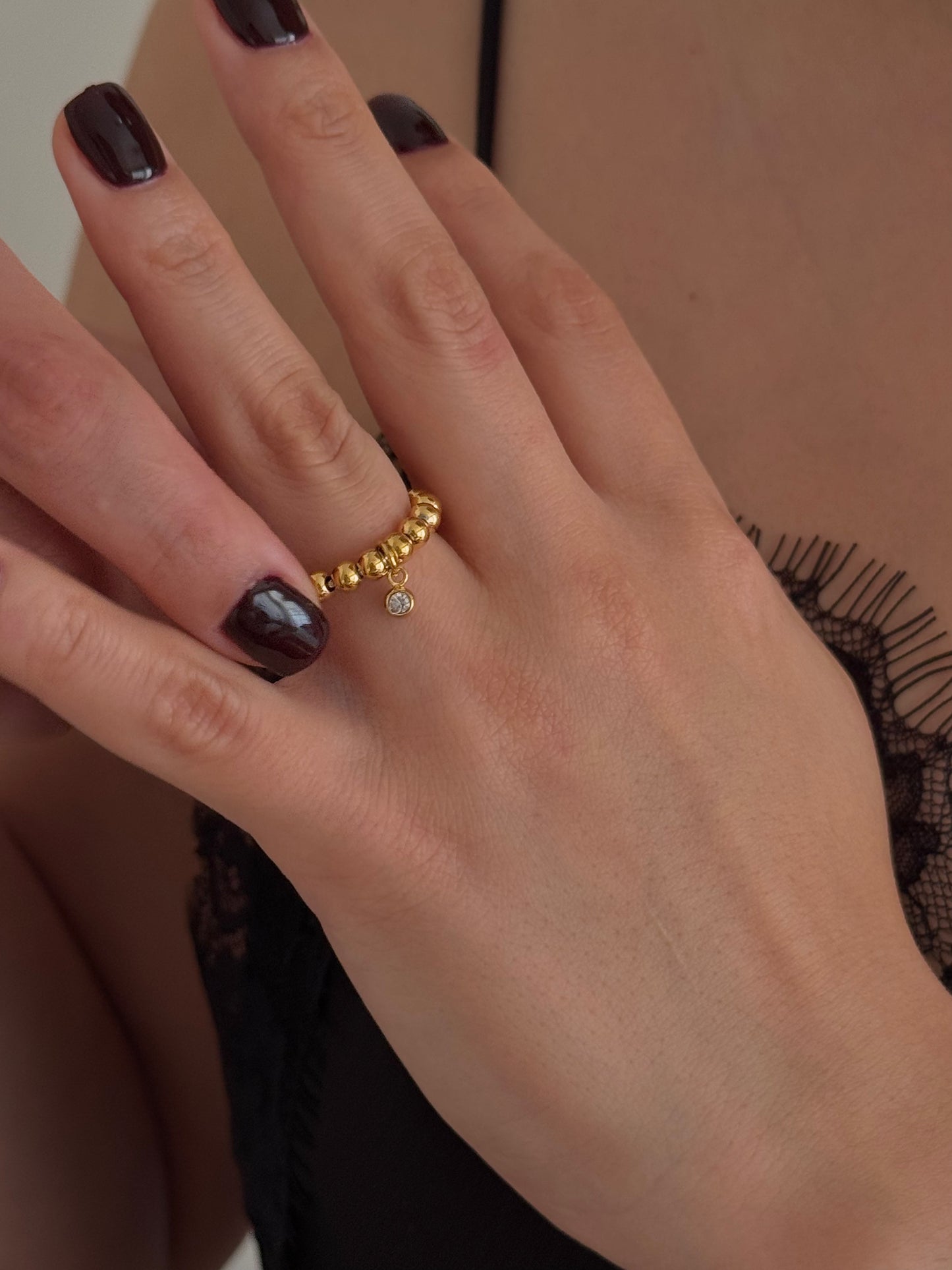 Anillo Bolita con Zirco Colgante Dorado