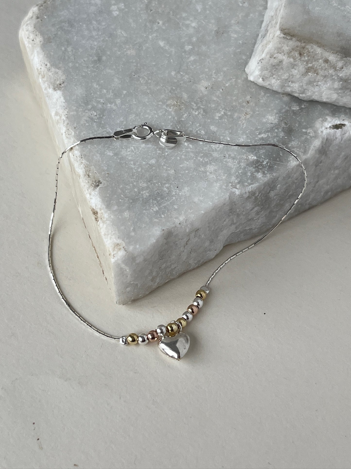 Pulsera Corazón Flotante