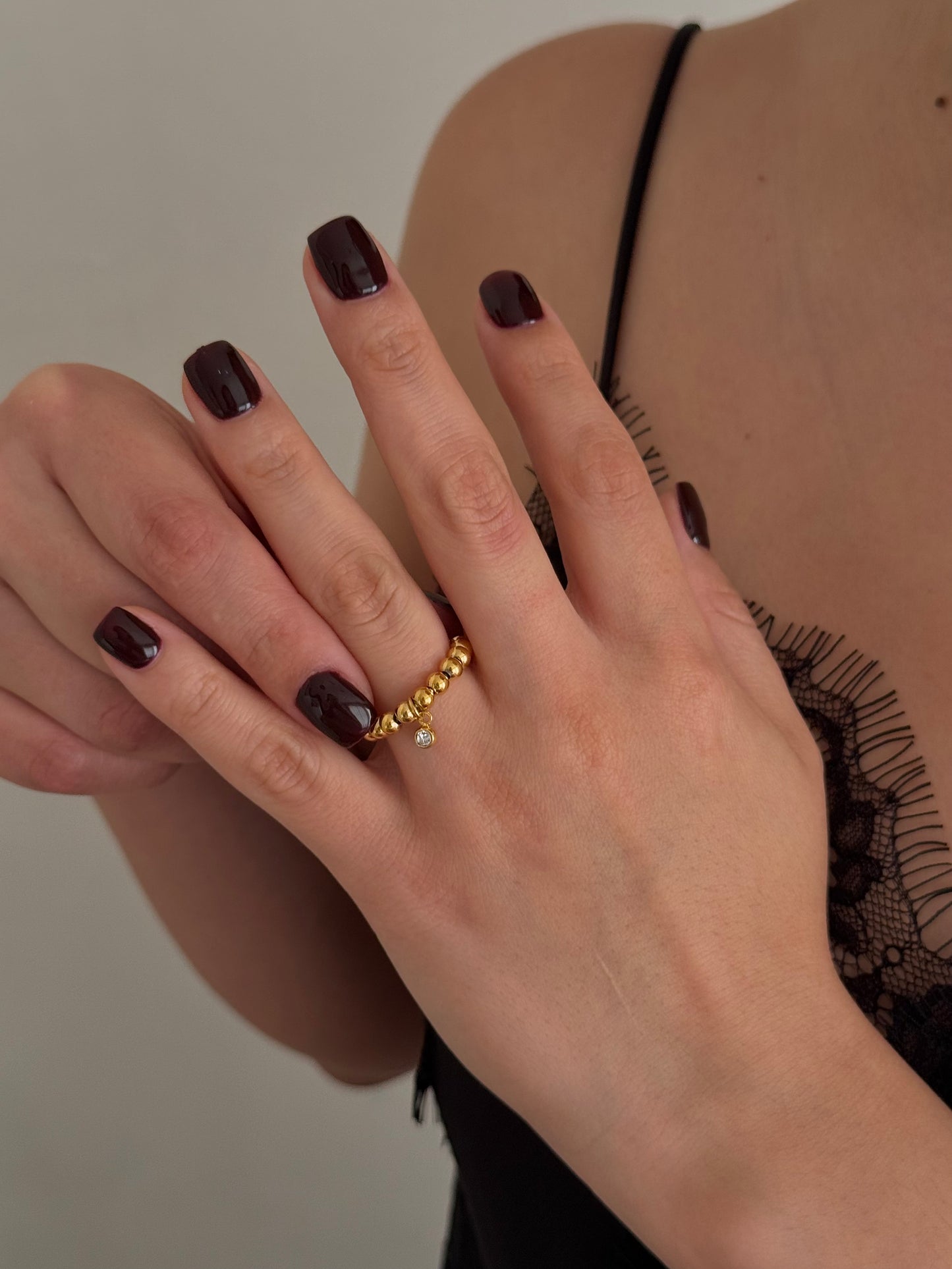 Anillo Bolita con Zirco Colgante Dorado