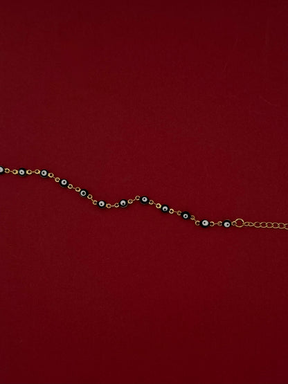 Pulsera Ojo Negro Dorada
