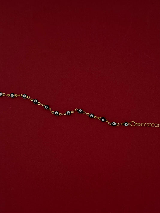 Pulsera Ojo Negro Dorada