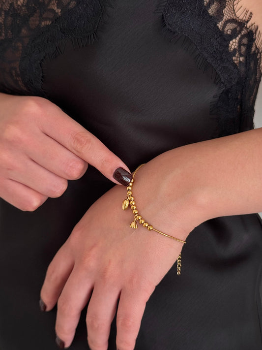 Pulsera Dos Flores Doradas