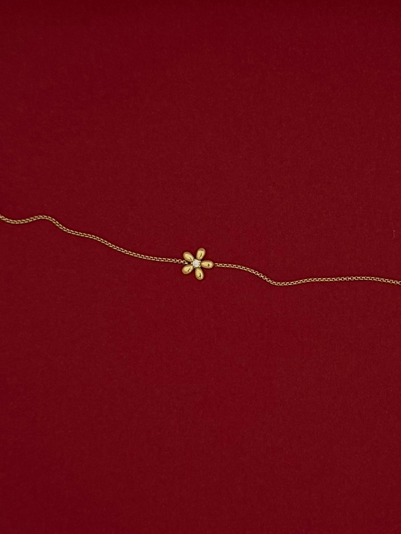 Pulsera Flor Globo con Zirconia Dorada