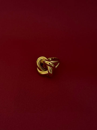 Anillo Círculo Hueco con Nudo Dorado