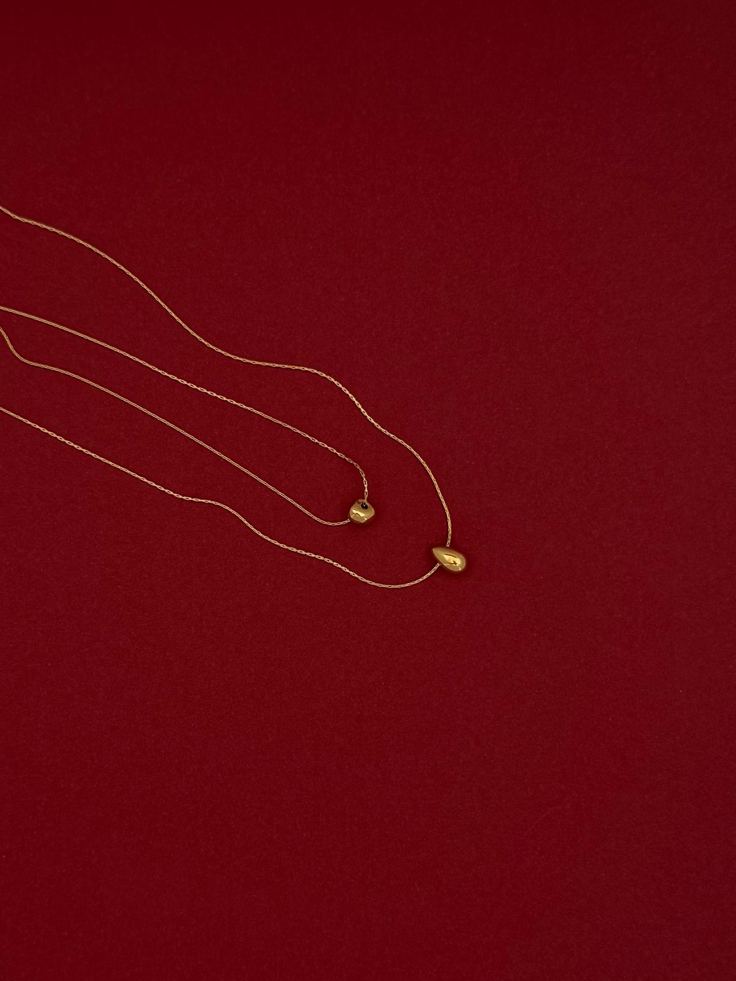 Collar Doble Triángulo Gota Lisa Dorado