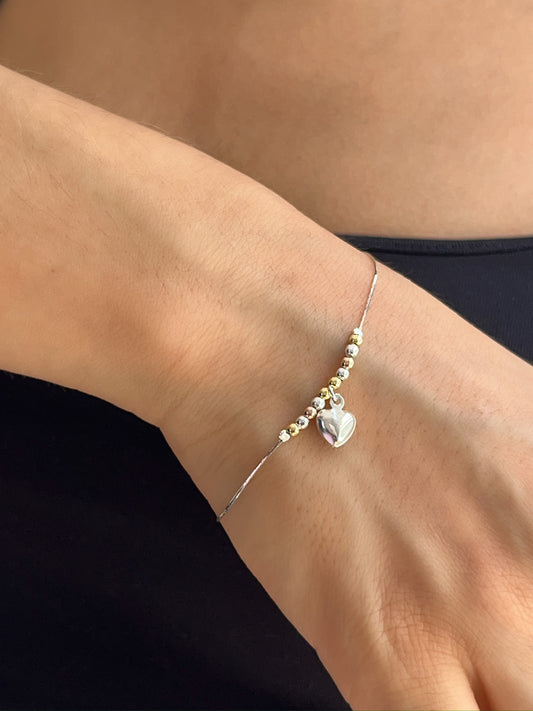 Pulsera Corazón Flotante