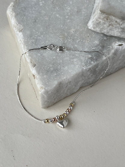 Pulsera Corazón Flotante