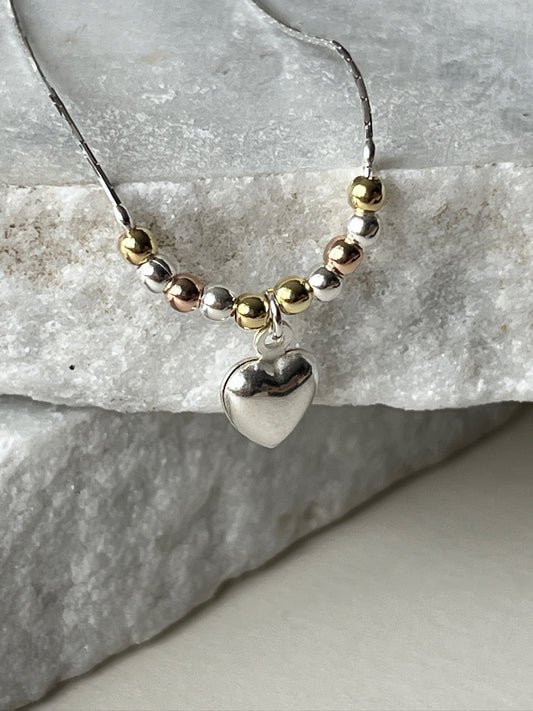 Pulsera Corazón Flotante