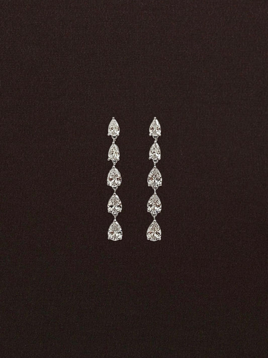 Aretes Gota Blanca en Garra